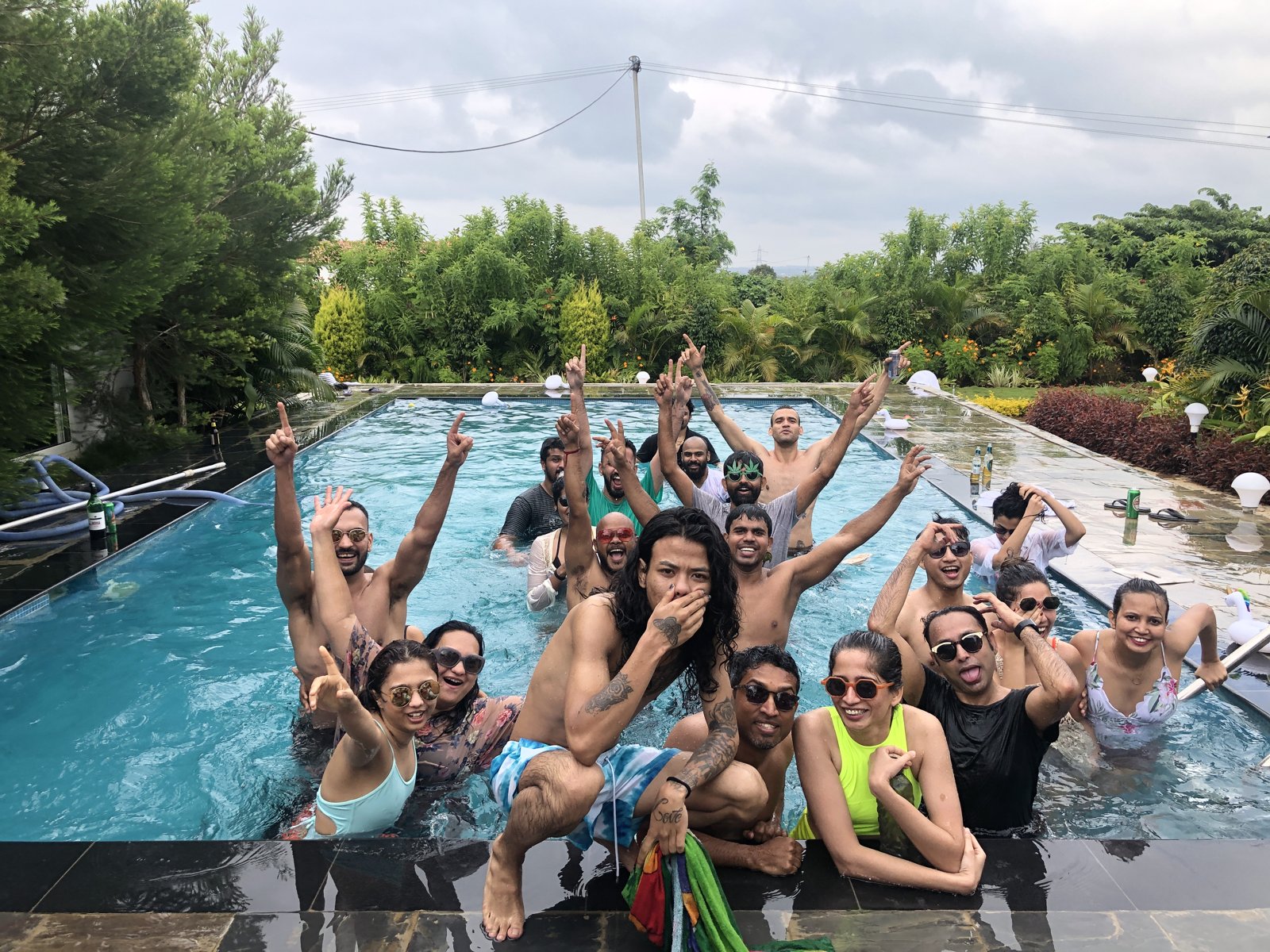 Large group celebrating in the pool