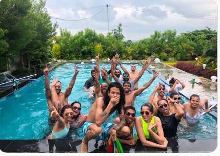 Group of friends enjoying the pool