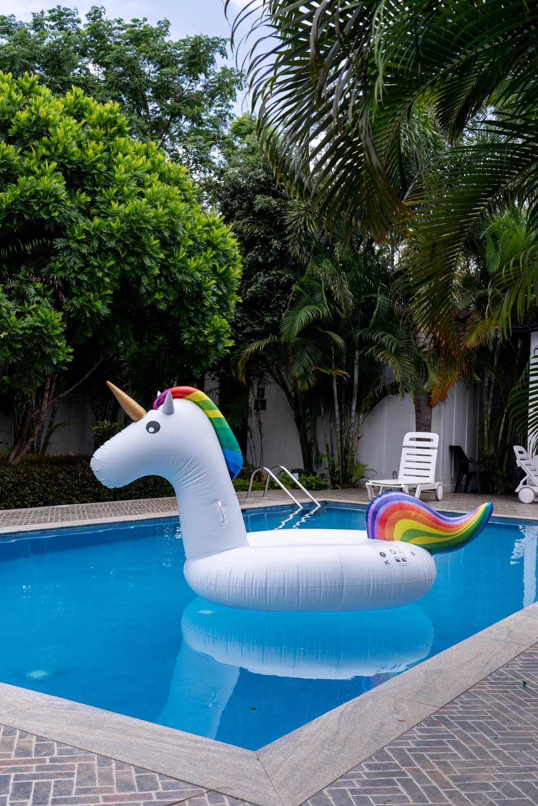 Unicorn pool floatie on a sunny day