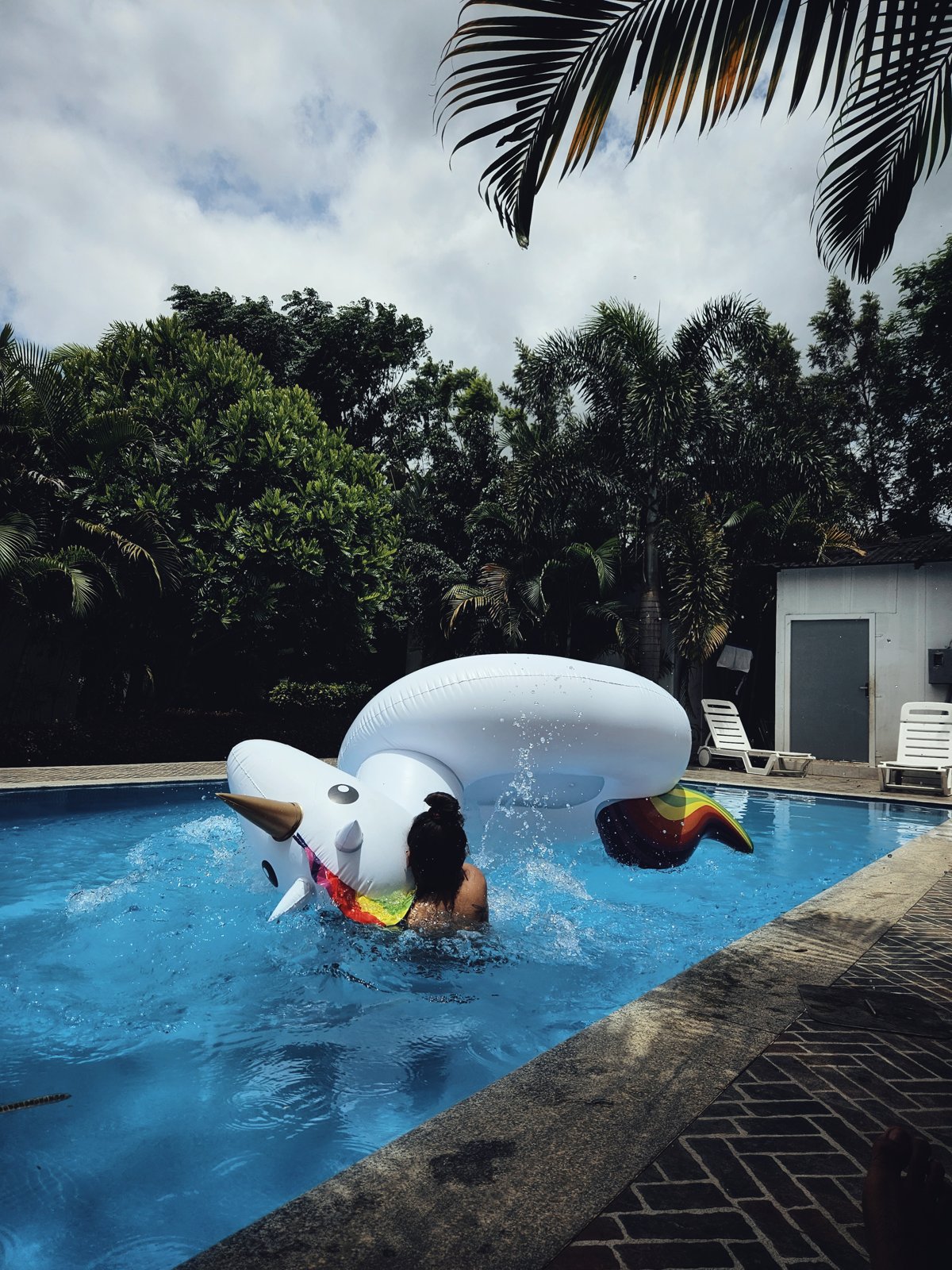 Swimming with the unicorn floatie